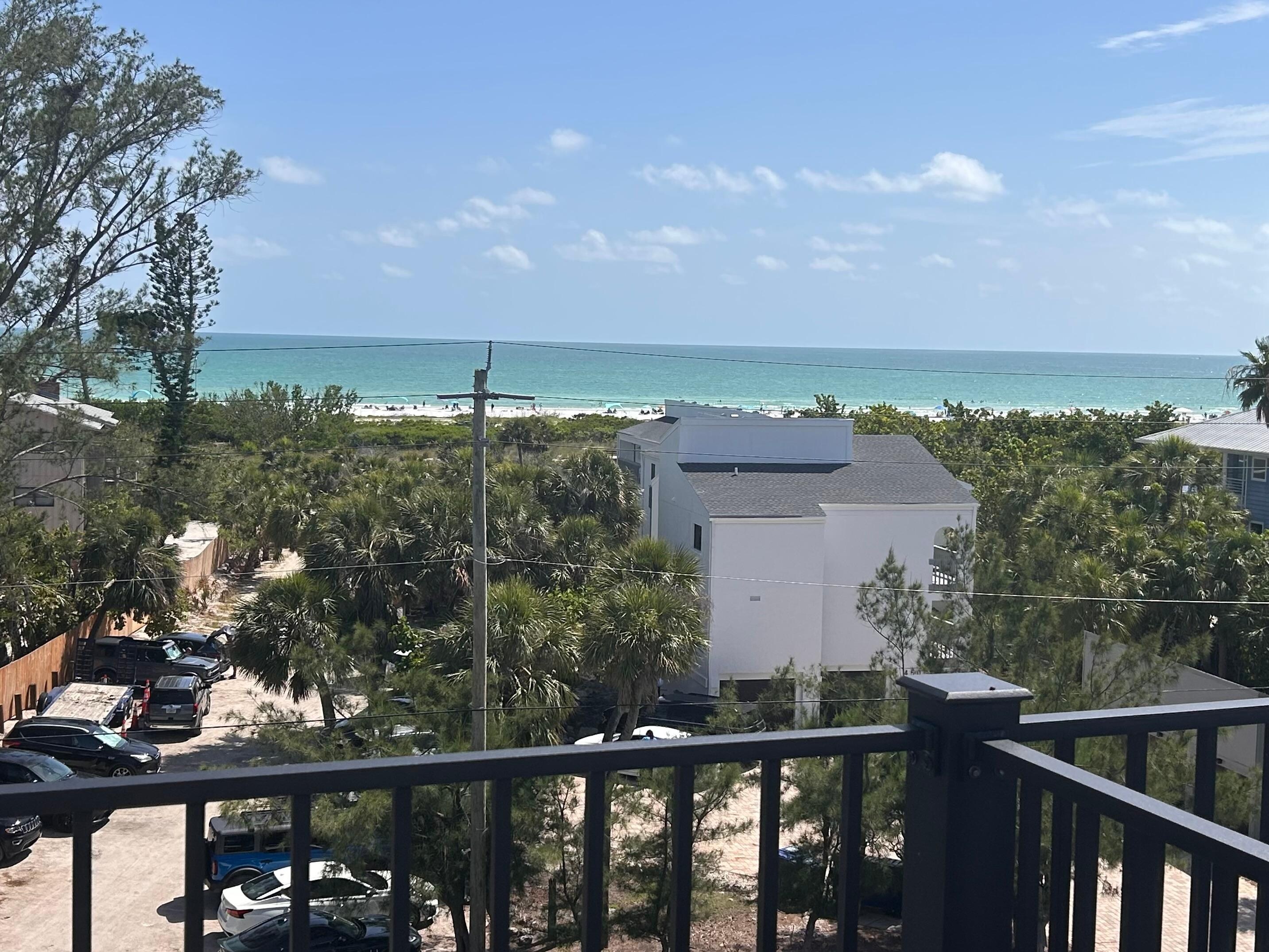 View of beach from   Top floor deck.