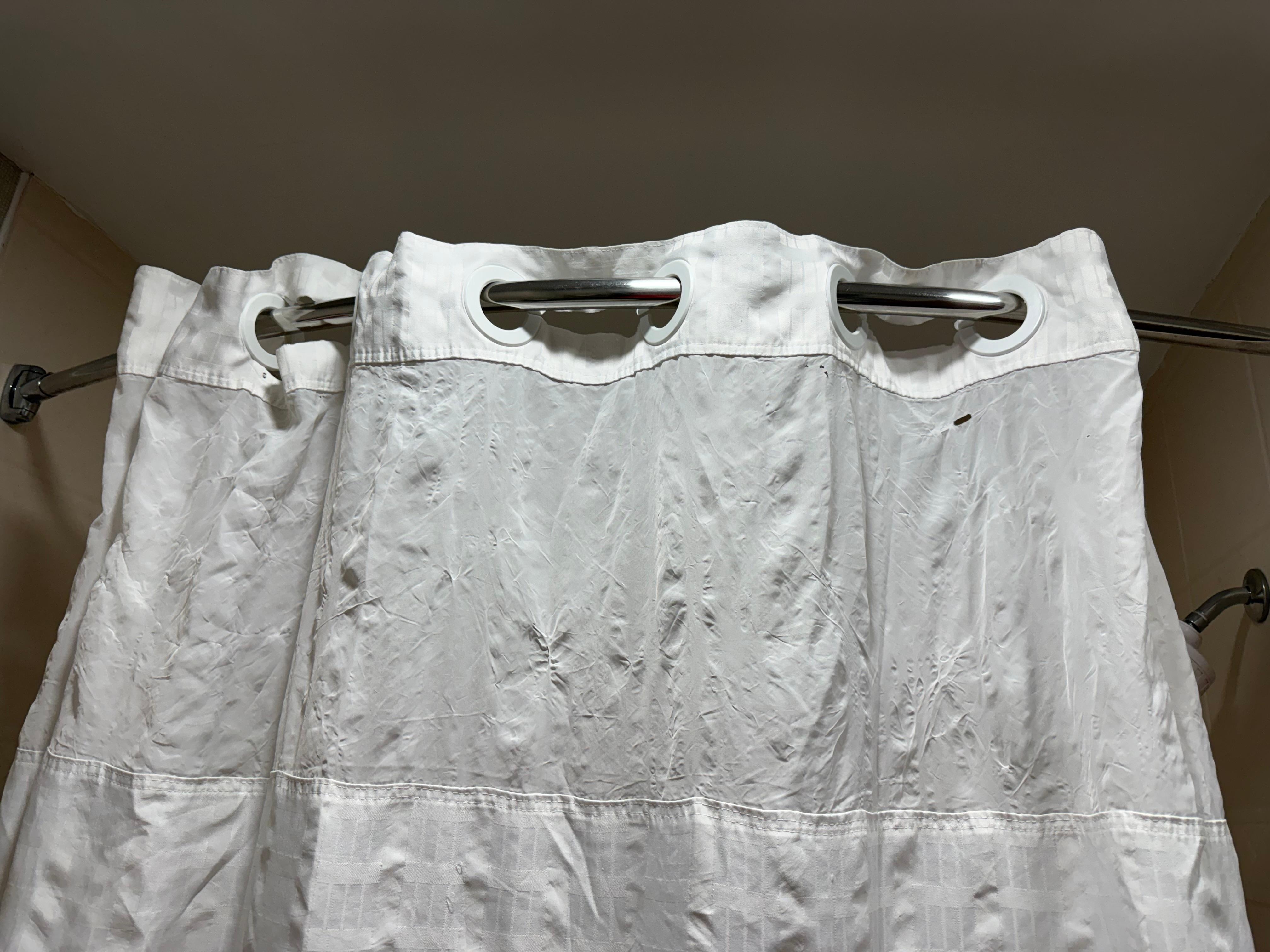 Shower curtain that had tears and holes in it