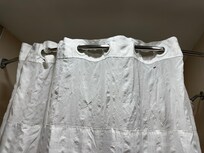 Shower curtain that had tears and holes in it