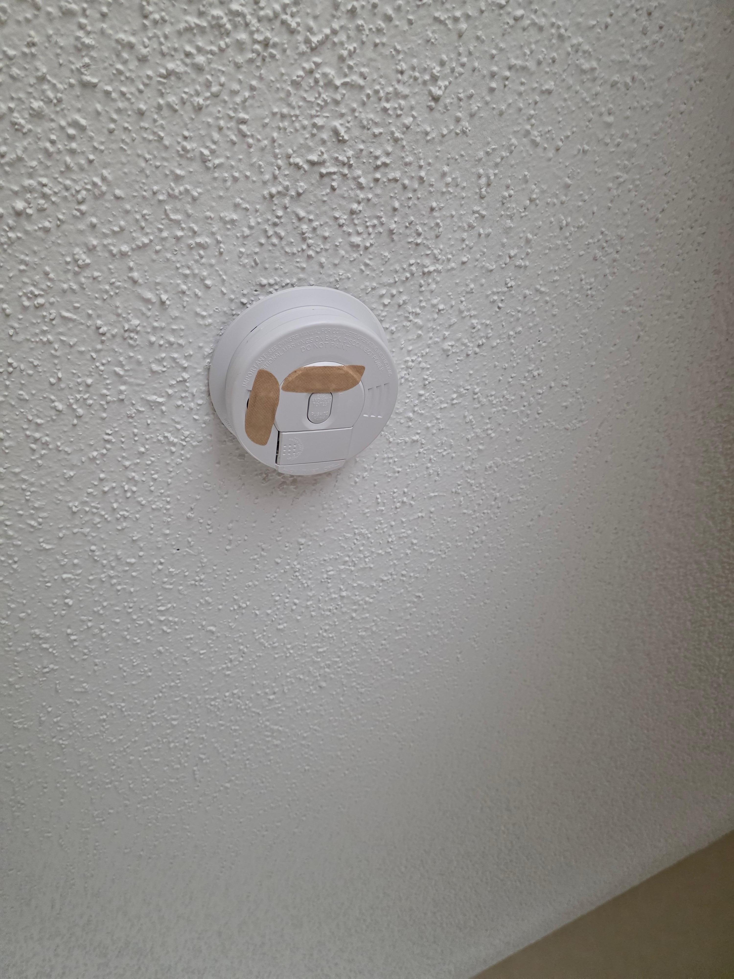 Bandaid on smoke carbon dioxide detector?¿