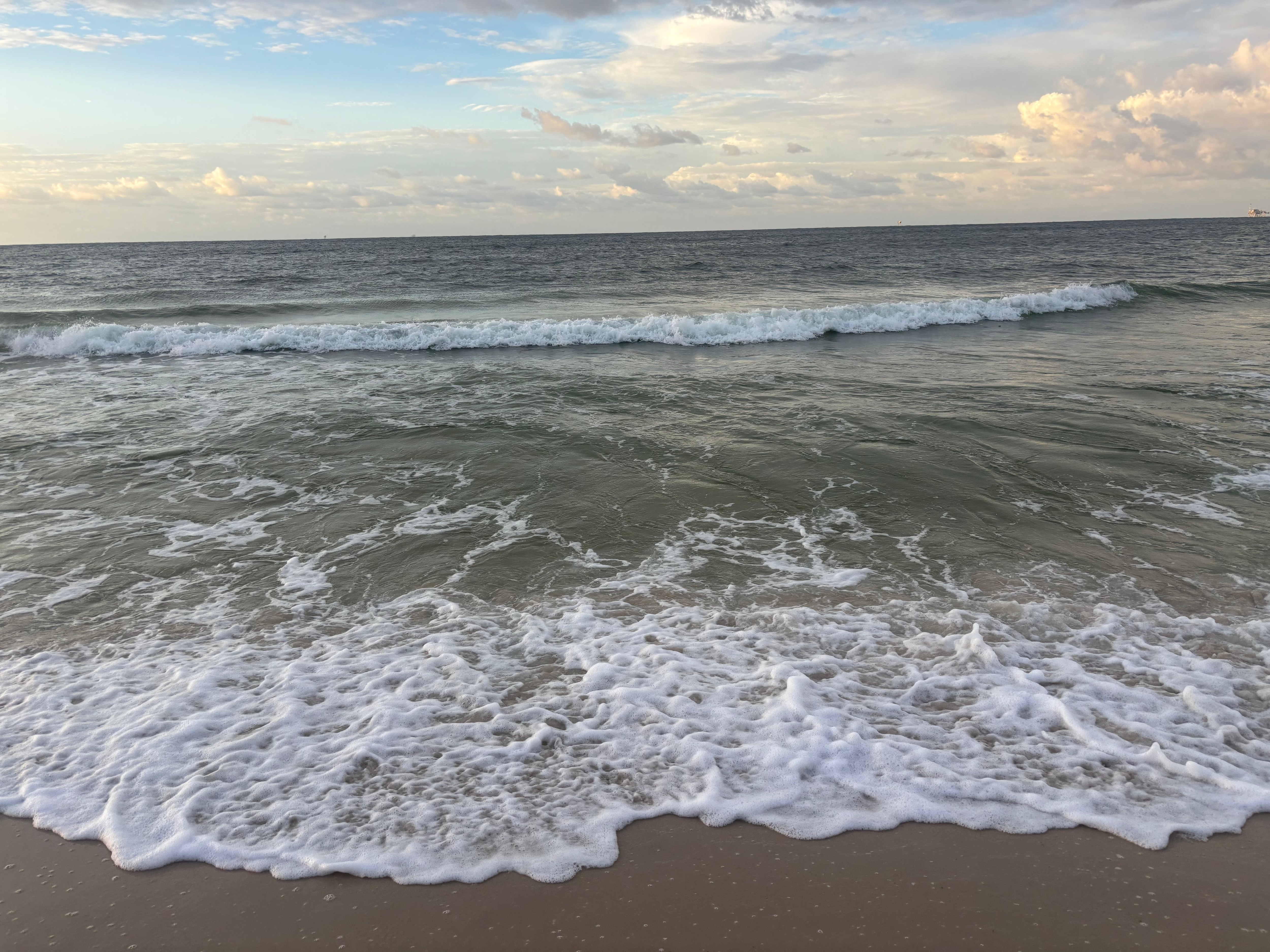 Out the back onto the beach, aprox. 100ft.