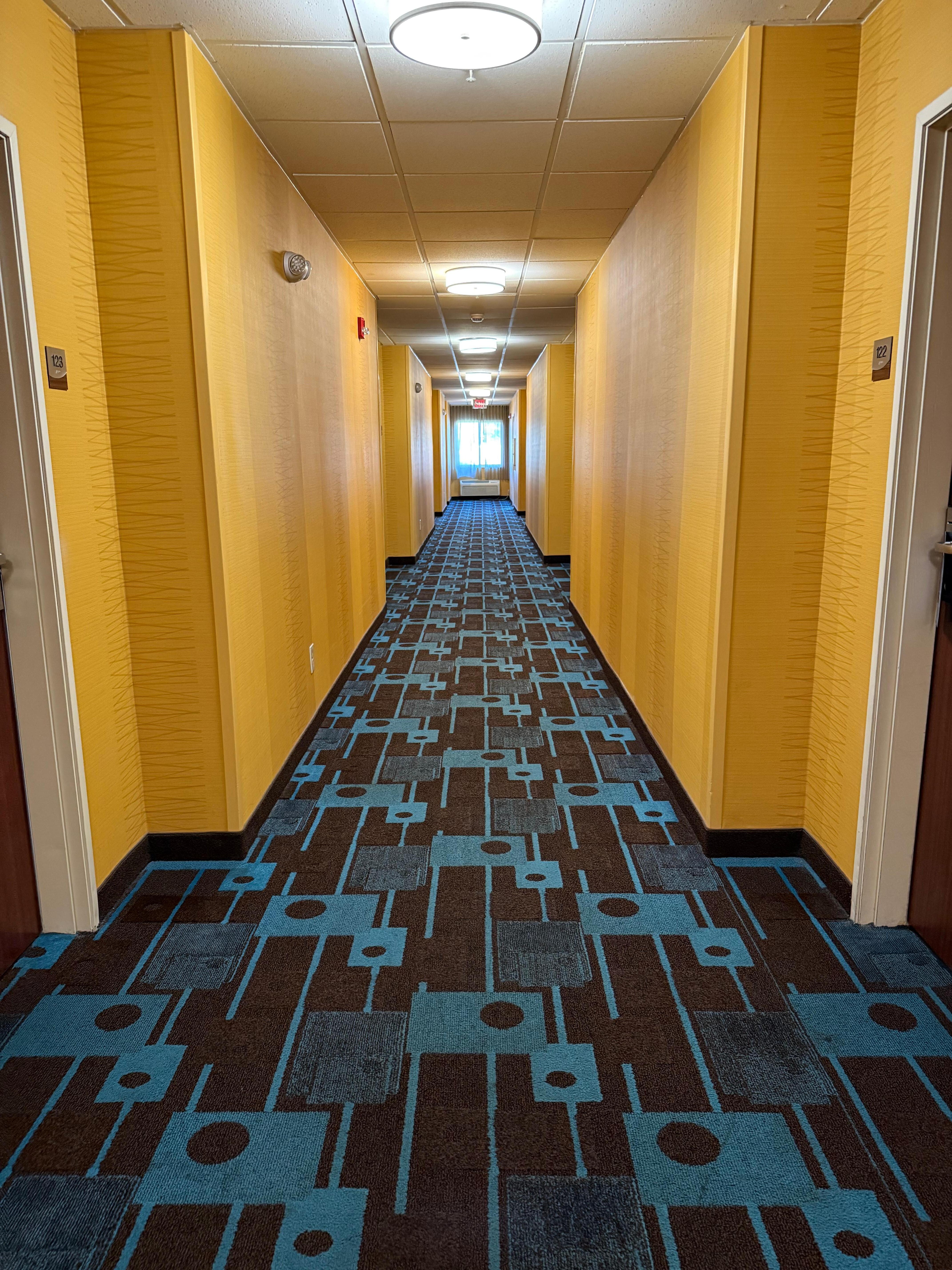 The hallway where I stayed. (Didn’t care for the yellow but it was tolerable).