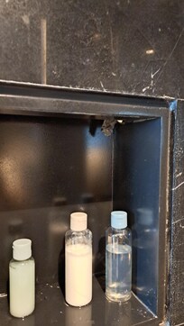 Exposed wire in the shower.