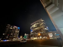 Empty parking lot adjacent to hotel property