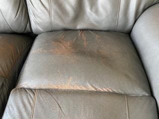 Worn out couch right side