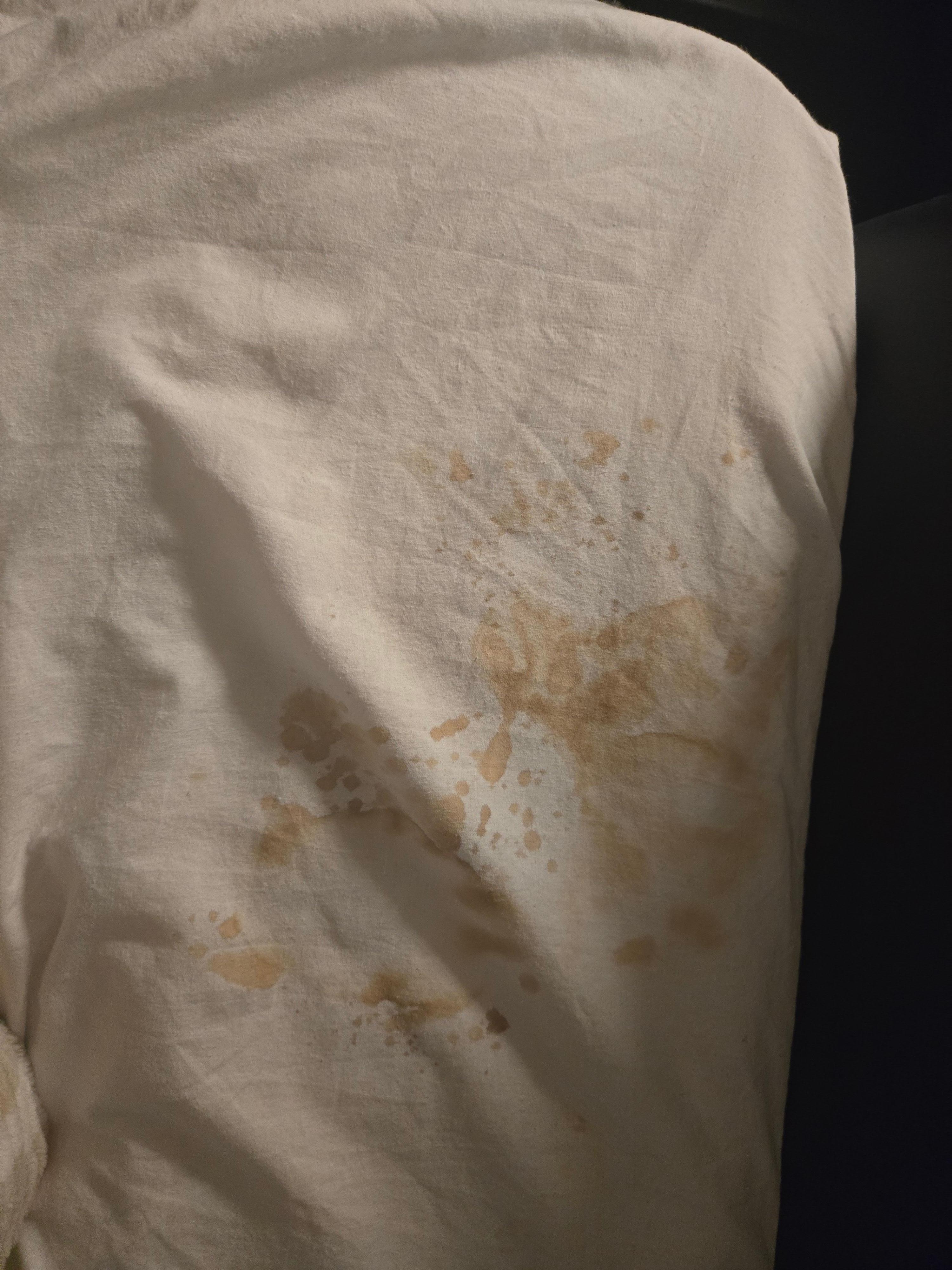 Stain on sheet. 
