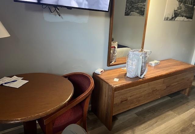 Small table 2 chairs sitting spot w/ TV