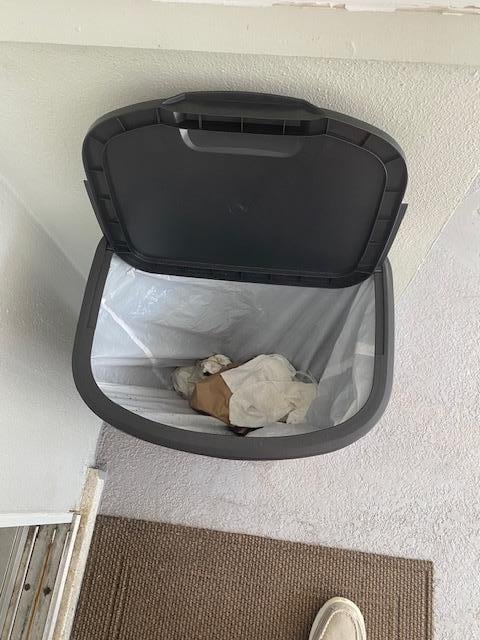 Back patio garbage was not emptied between guest