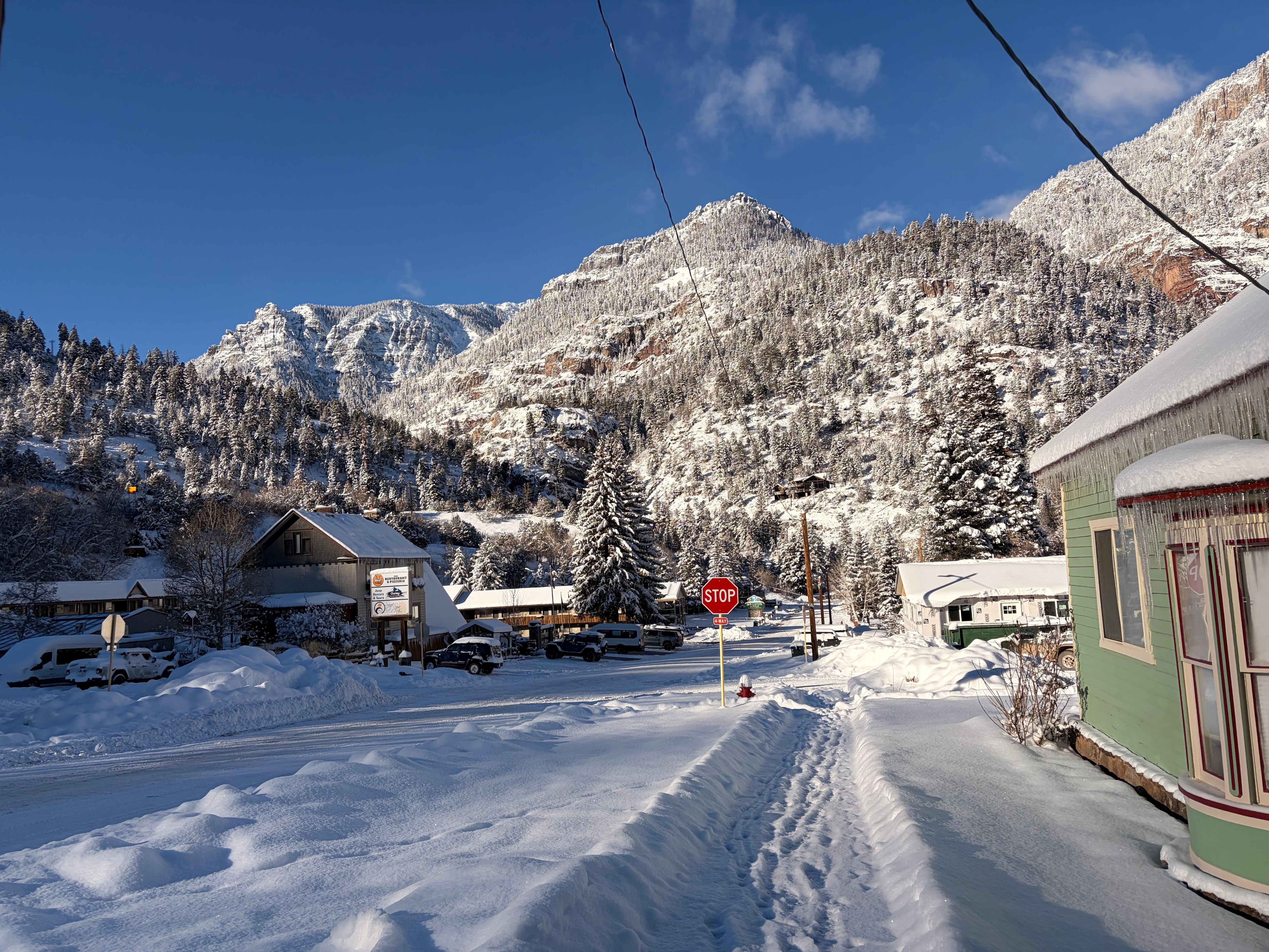 It snowed our second day there, this is the side street next to the house. 