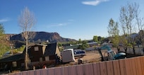 The owners house behind the cabin