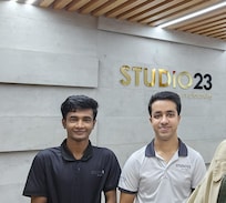 Desk Clerk and service personnel Zahid and Polash.