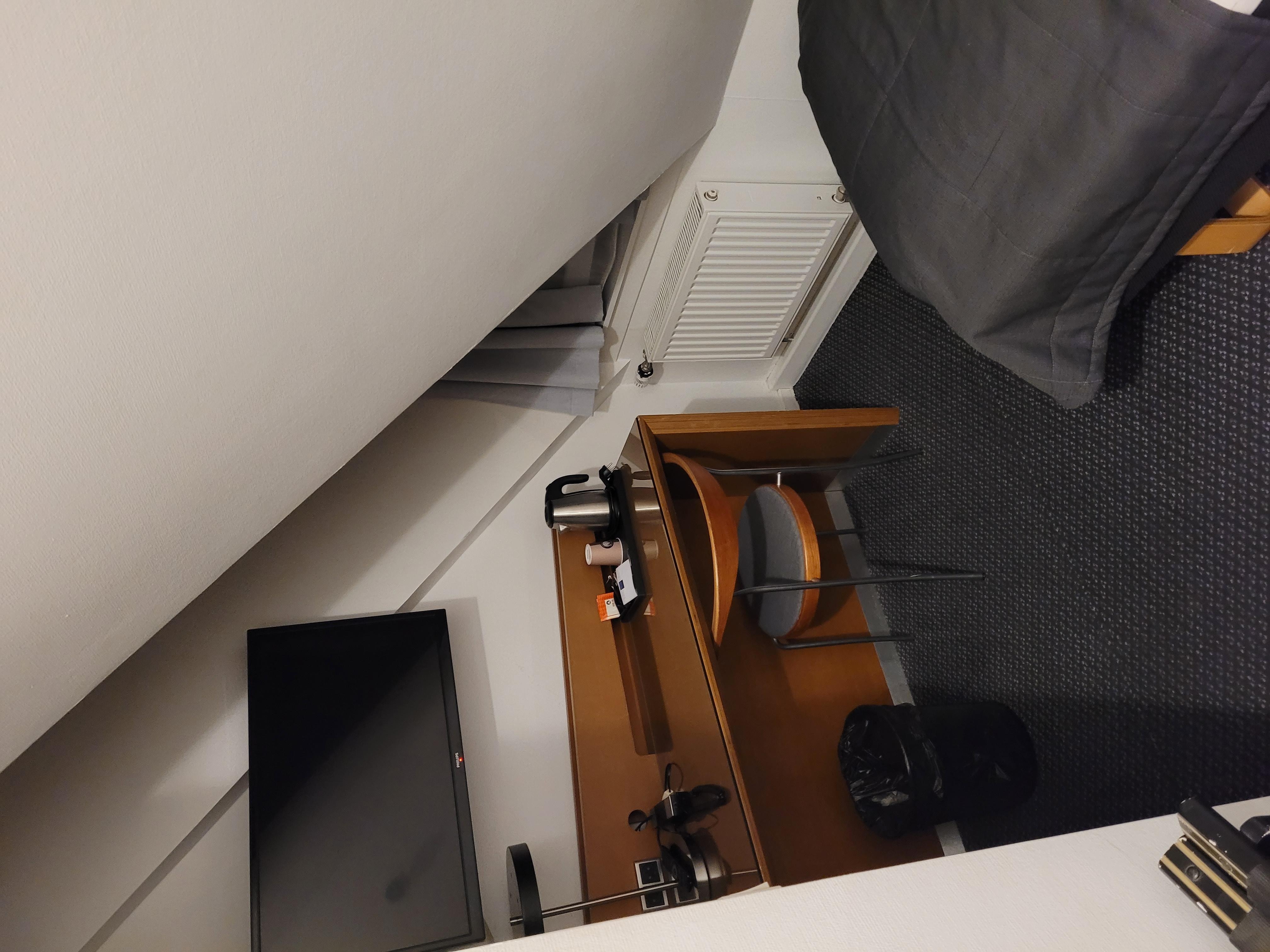 Top floor is furnished attic equipped with bed, desk, tv, shower and toilet.