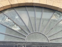 The window on the entrance to building