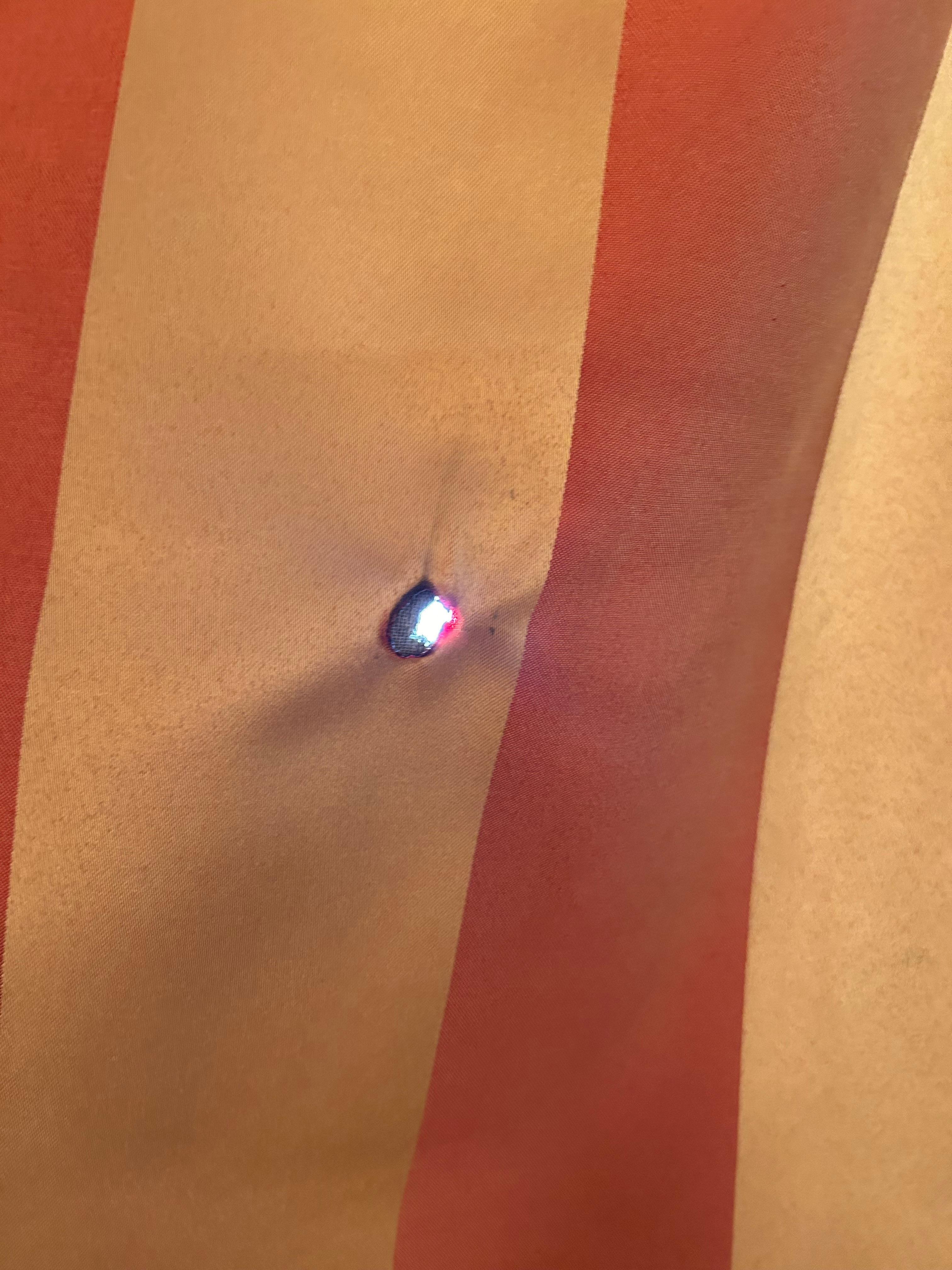 Burn holes in curtains 