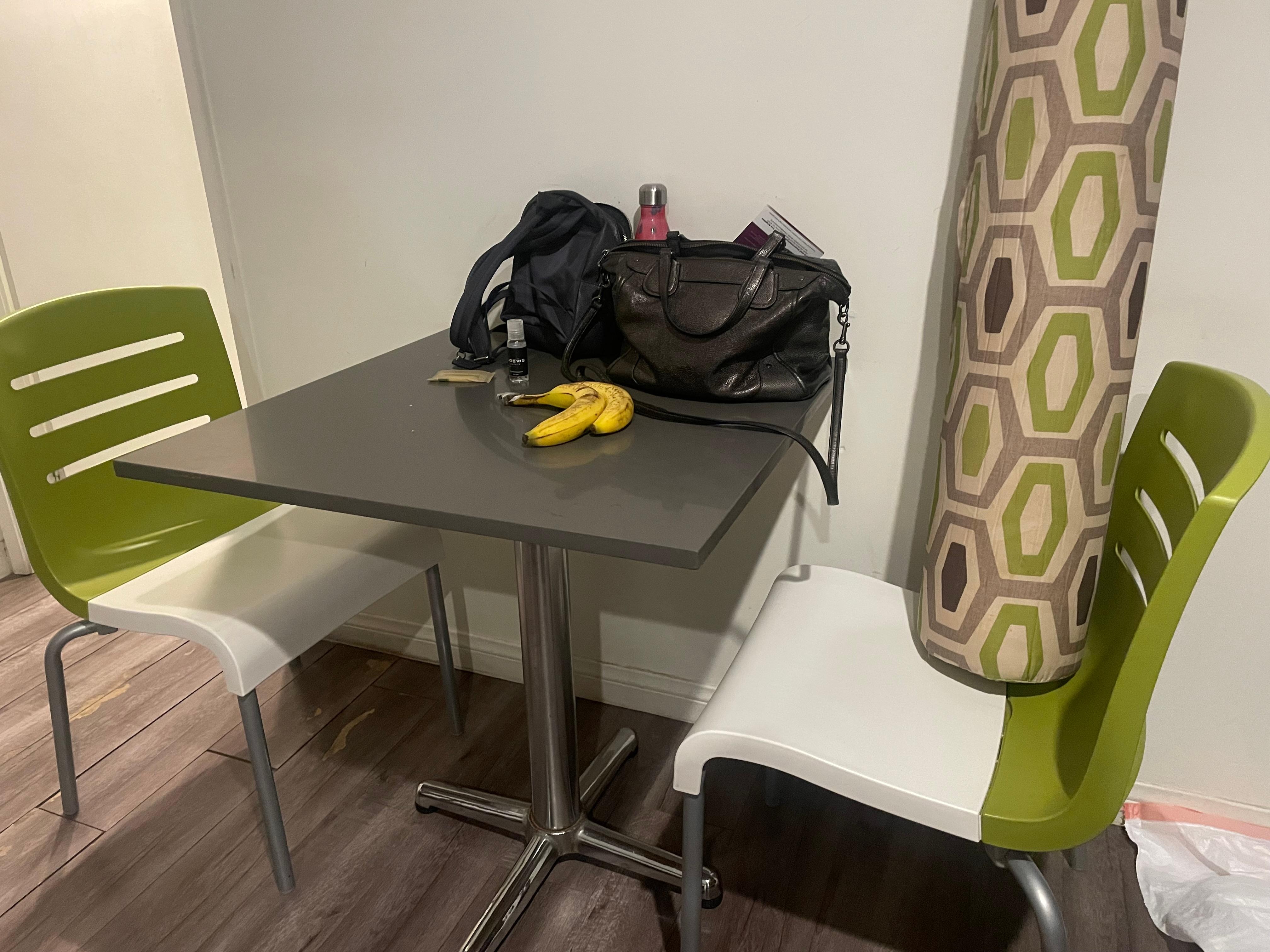 table chair set in the queen bedroom