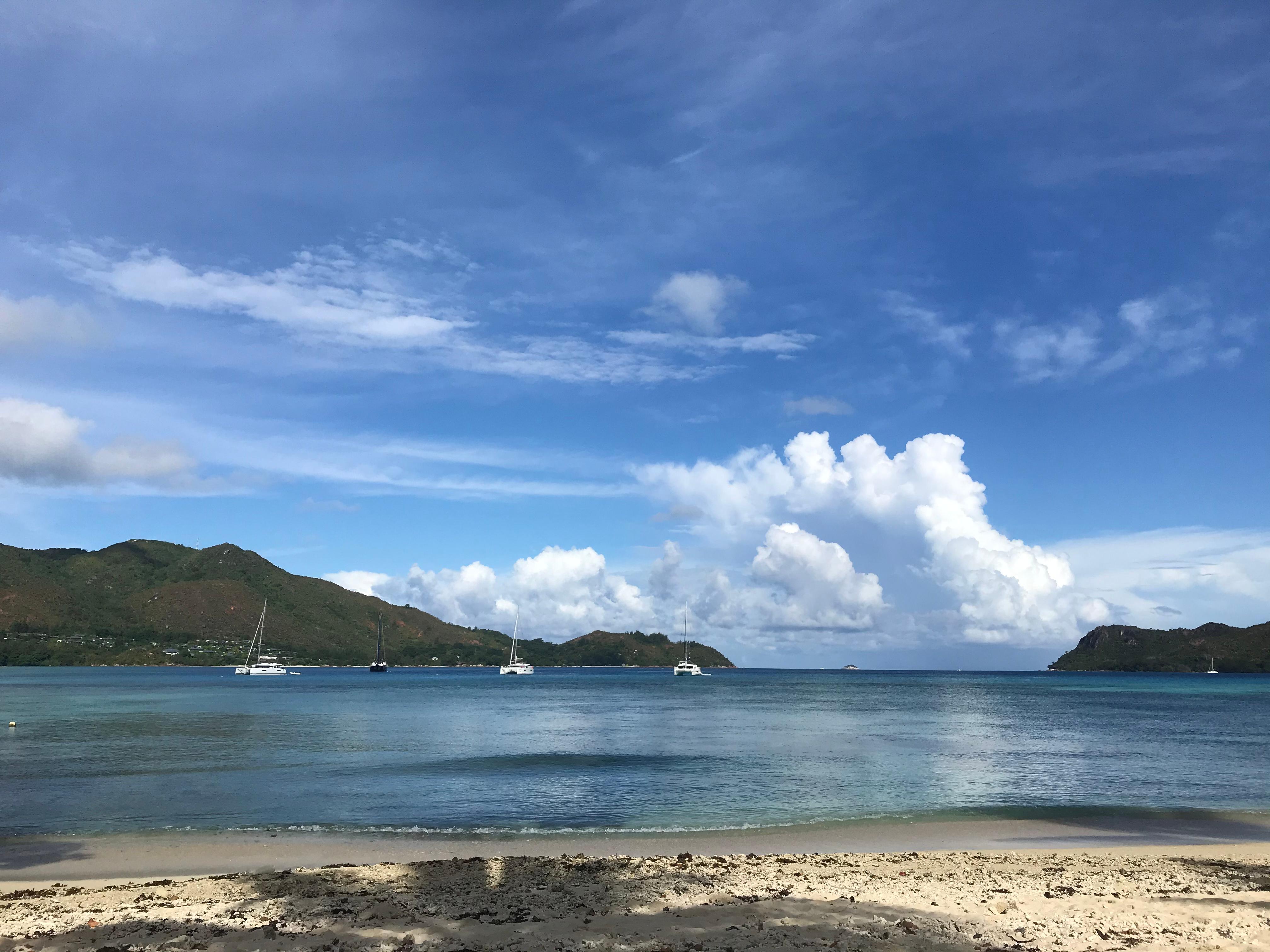 Quiet beach in front, wear shoes as lots of coral on beach 