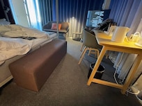 The purple "cushion" that make me kicked on several times.  Luckily I did not fall on ground or hit on the desk.