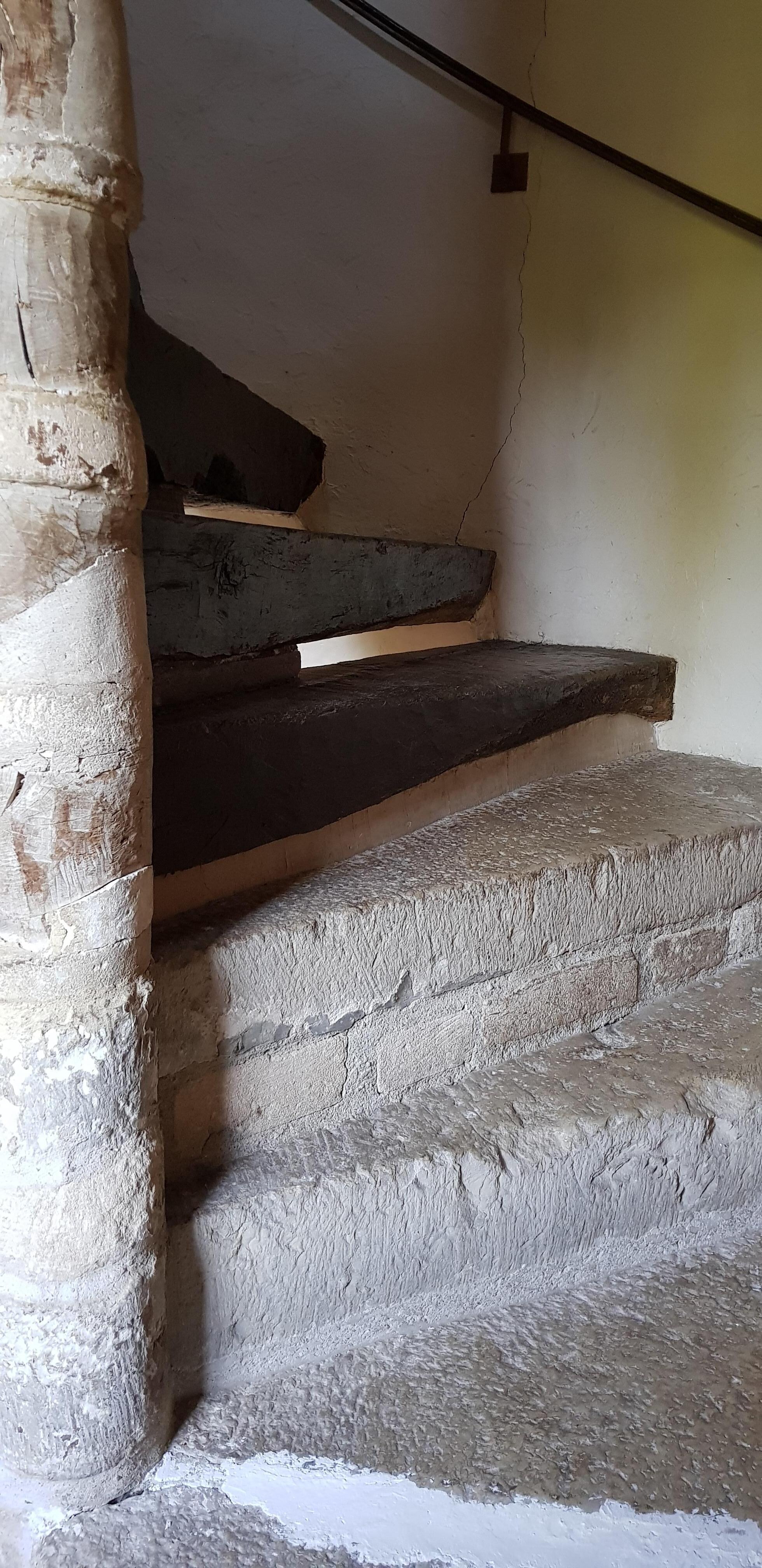Stone and oak spiral staircase