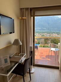 Small single room with terrace, noisy at night when customers stay late and smoke dwelling on the terrace