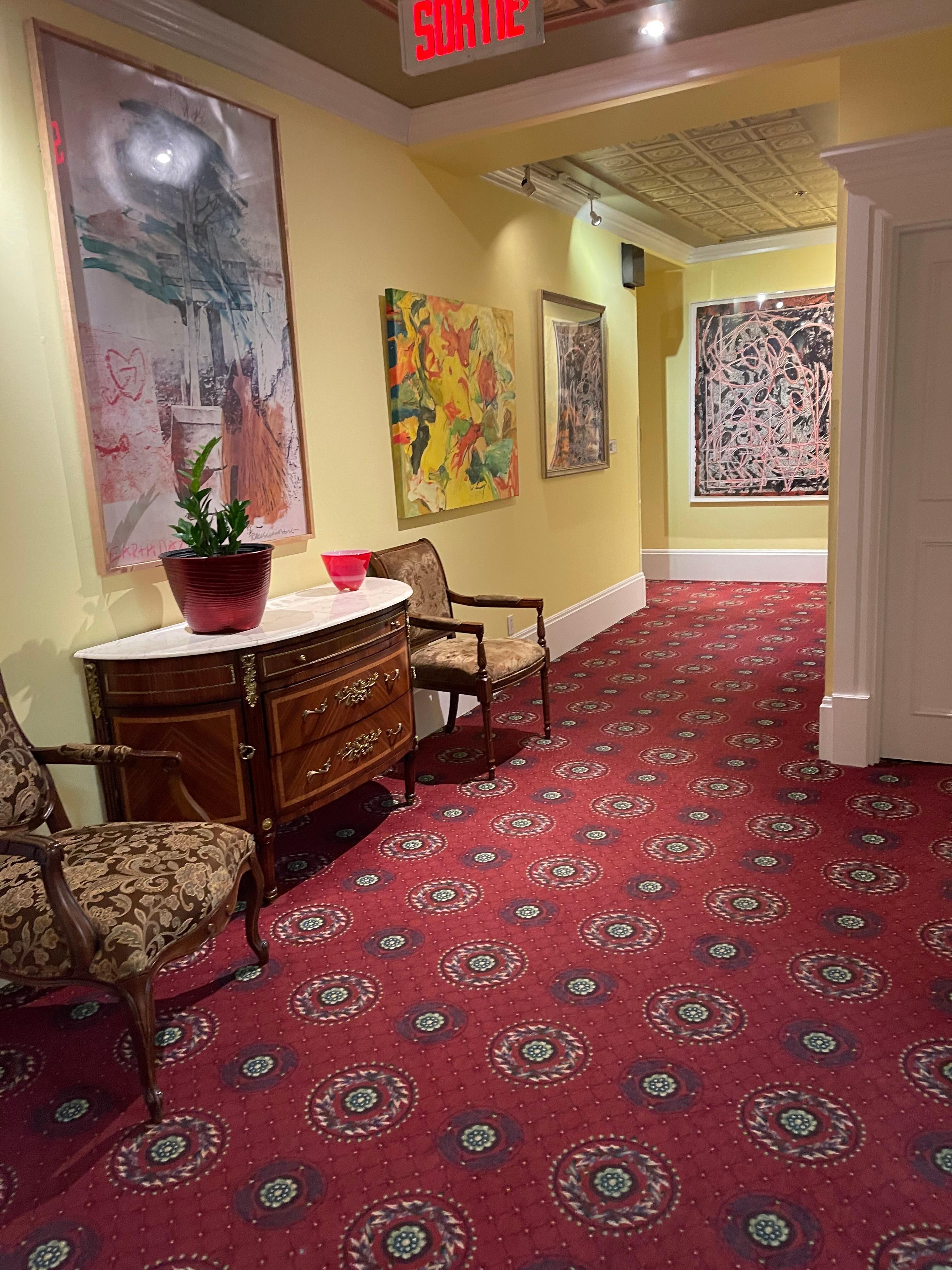 The hallways are filled with interesting art work and furniture