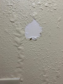 Peeling paint in bathroom