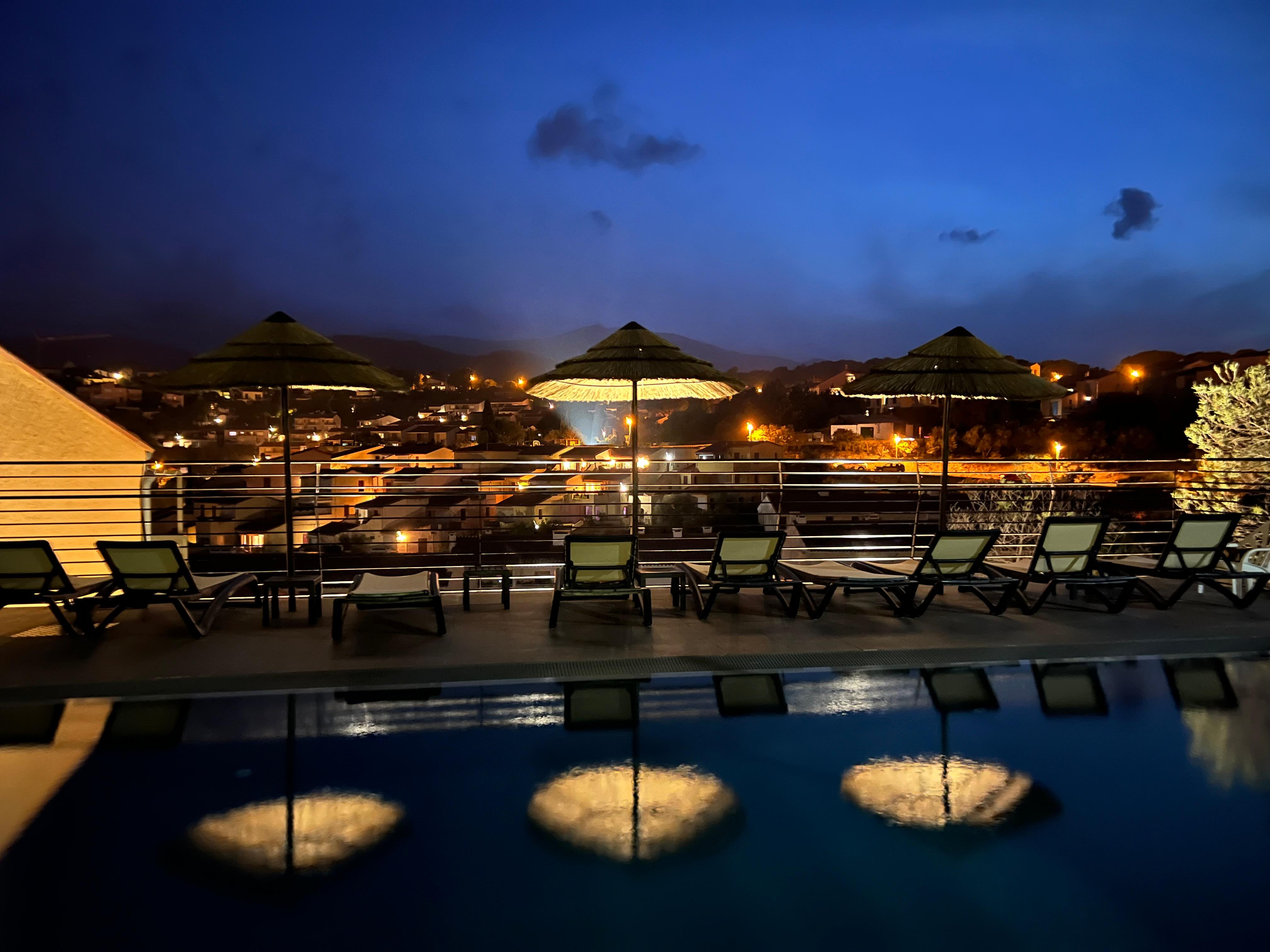 Rooftop pool at night 🌙