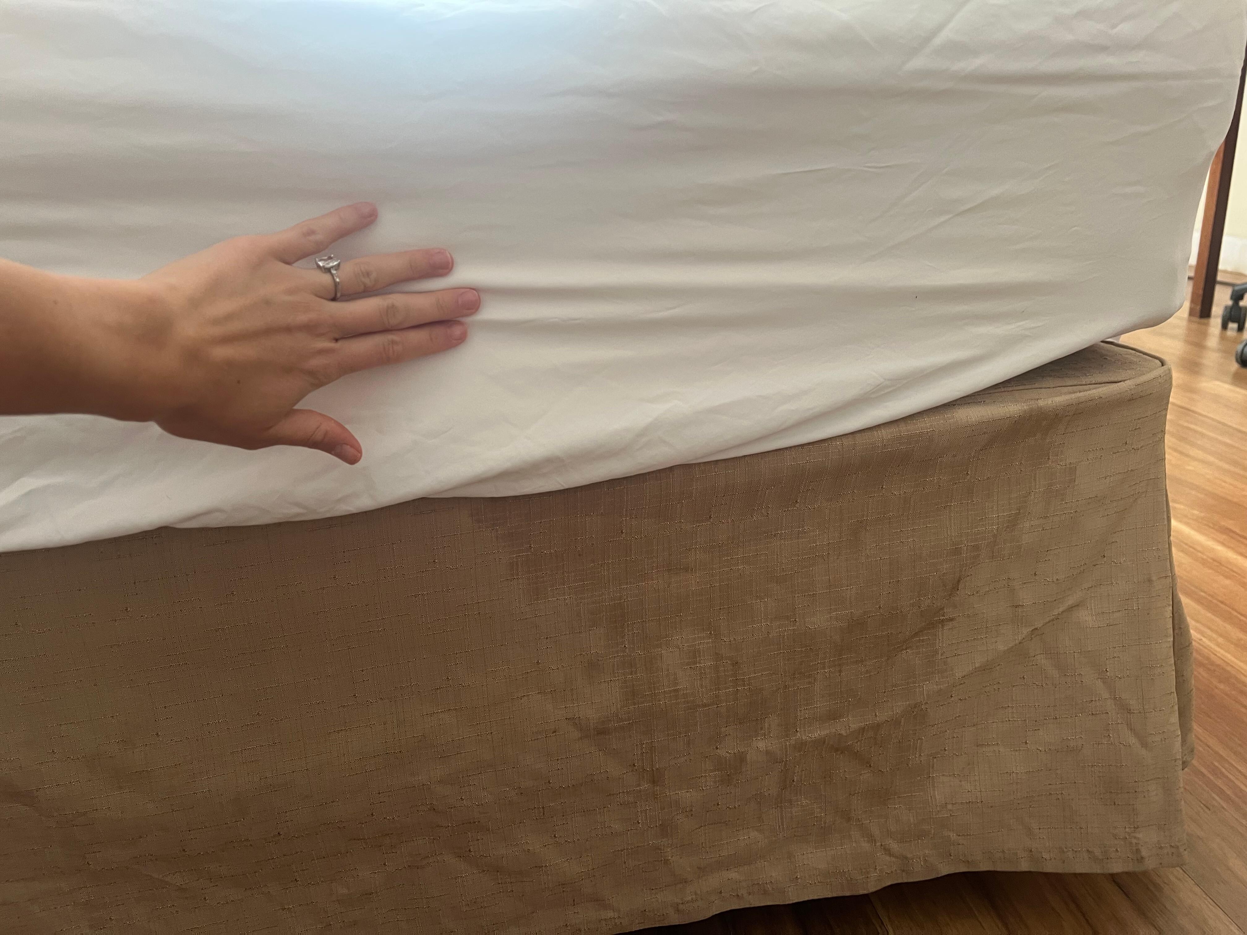Stained linens on bed