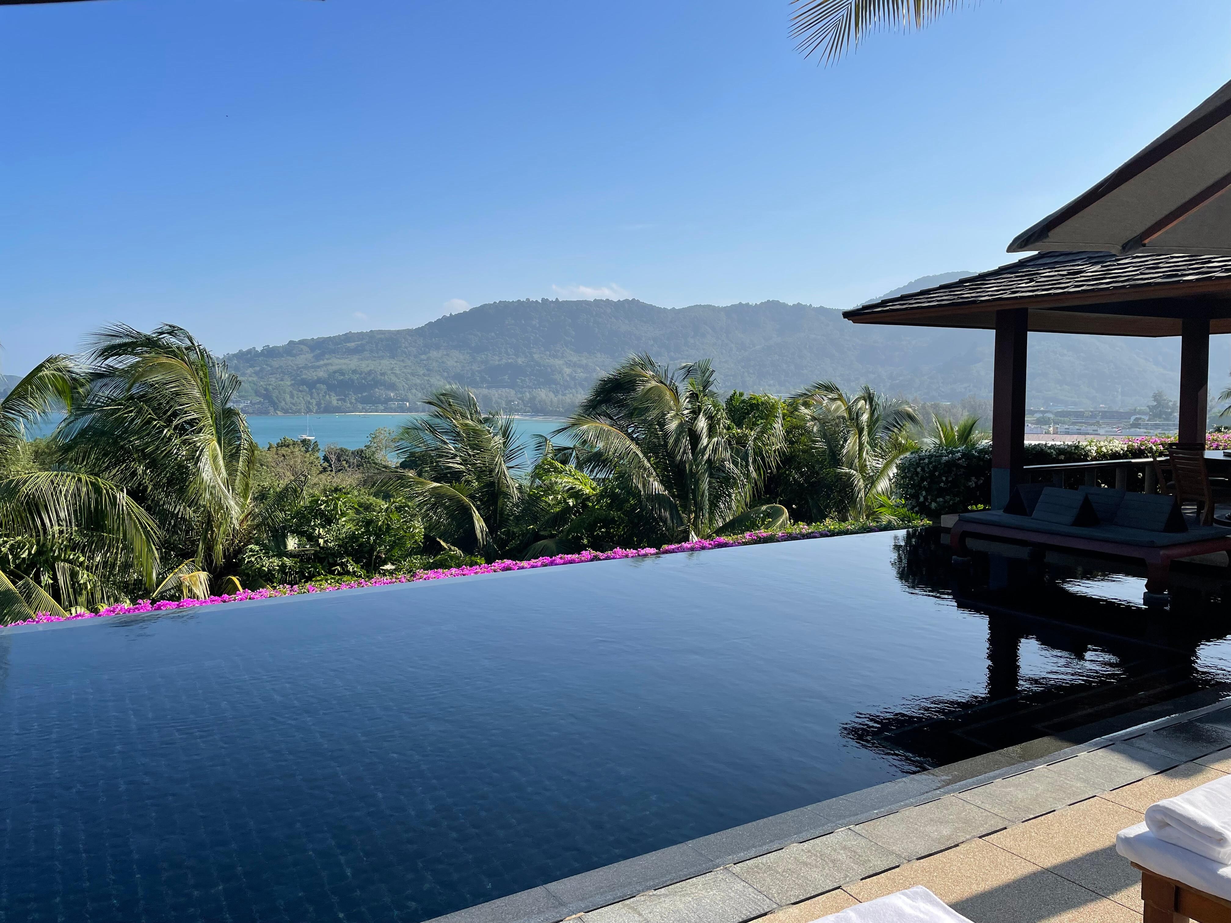 Our own private infinity pool with gazebo dining area right corner