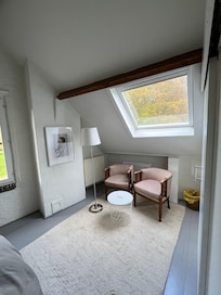 The seating area in the bedroom