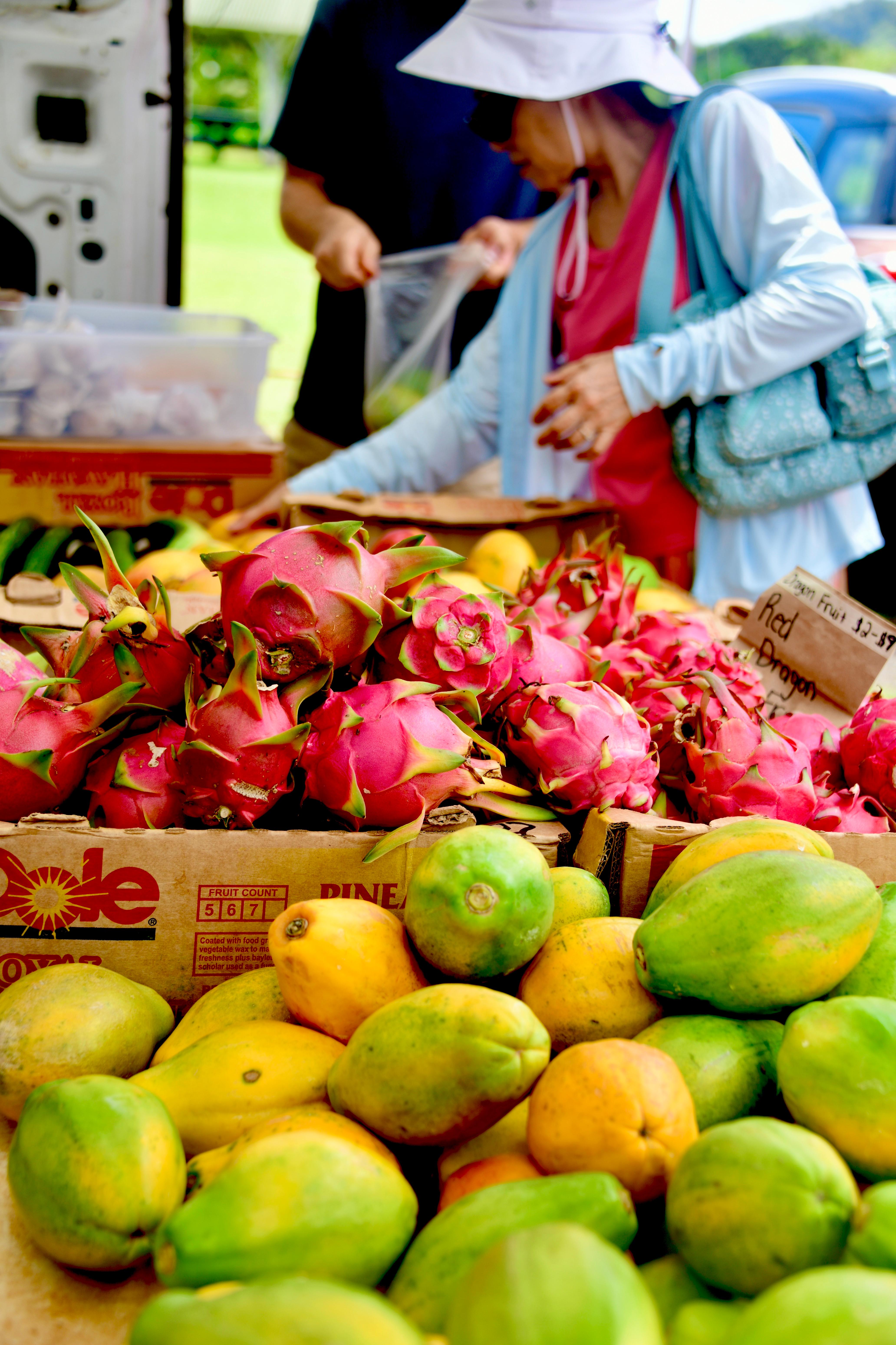 buying fresh fruits from the local's residents.