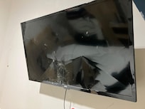 Smashed up TV screen