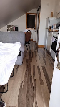 View of single small room room from entrance door