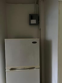 Exposed electric box over fridge
