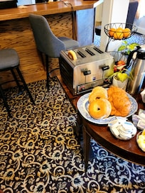 Half bagel in toaster from prior guest.