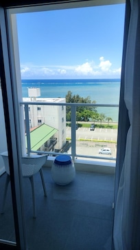 Two tall buildings are obstacles for complete seaview