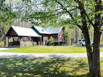 View of cabin looking from the pond.