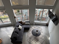 The view from upstairs looking down to living area