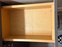 More water damage inside the bathroom drawer connected to the main bedroom.