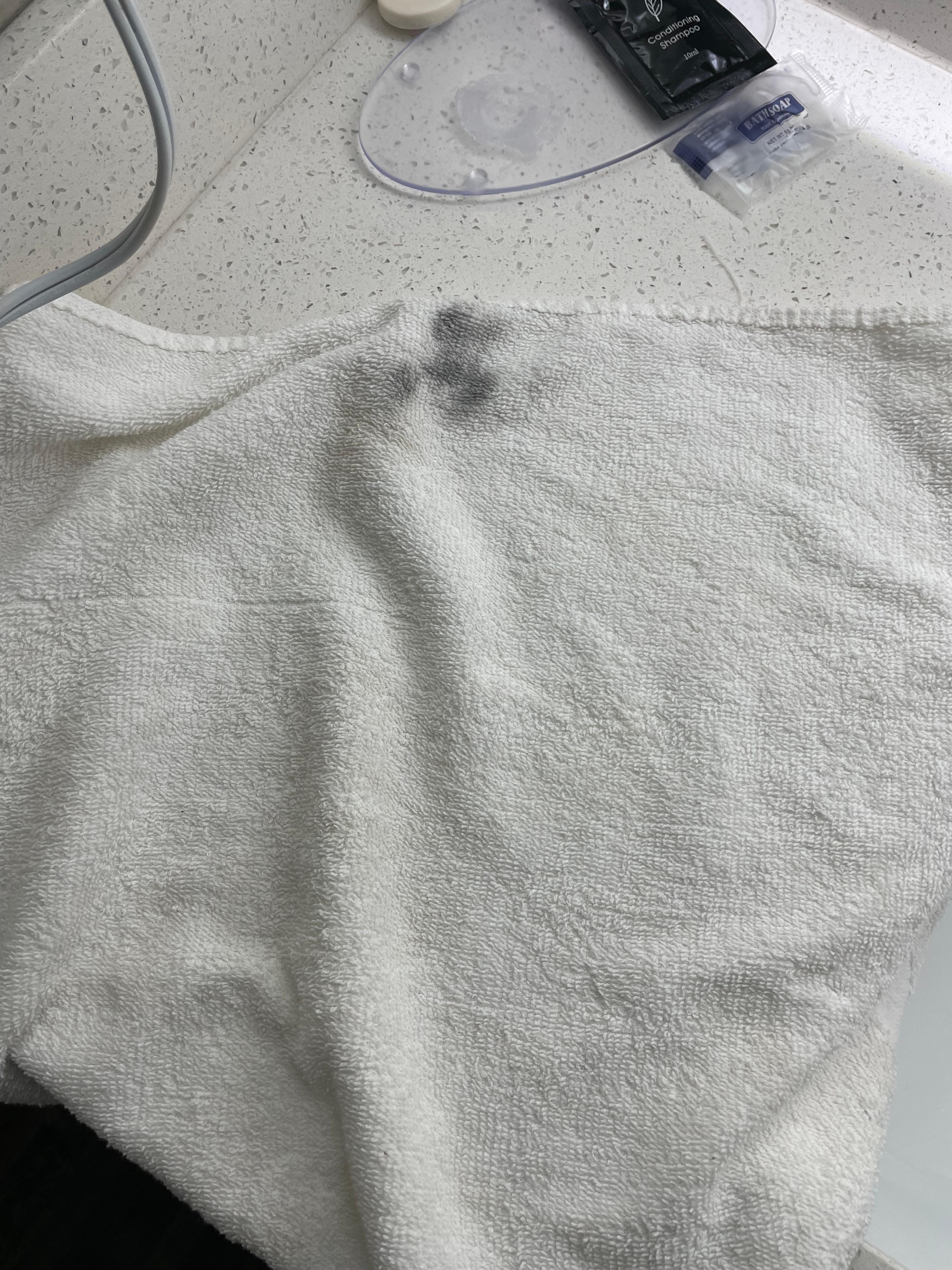Hand towel with unknown black marks