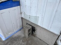 Broken glass near rear entry