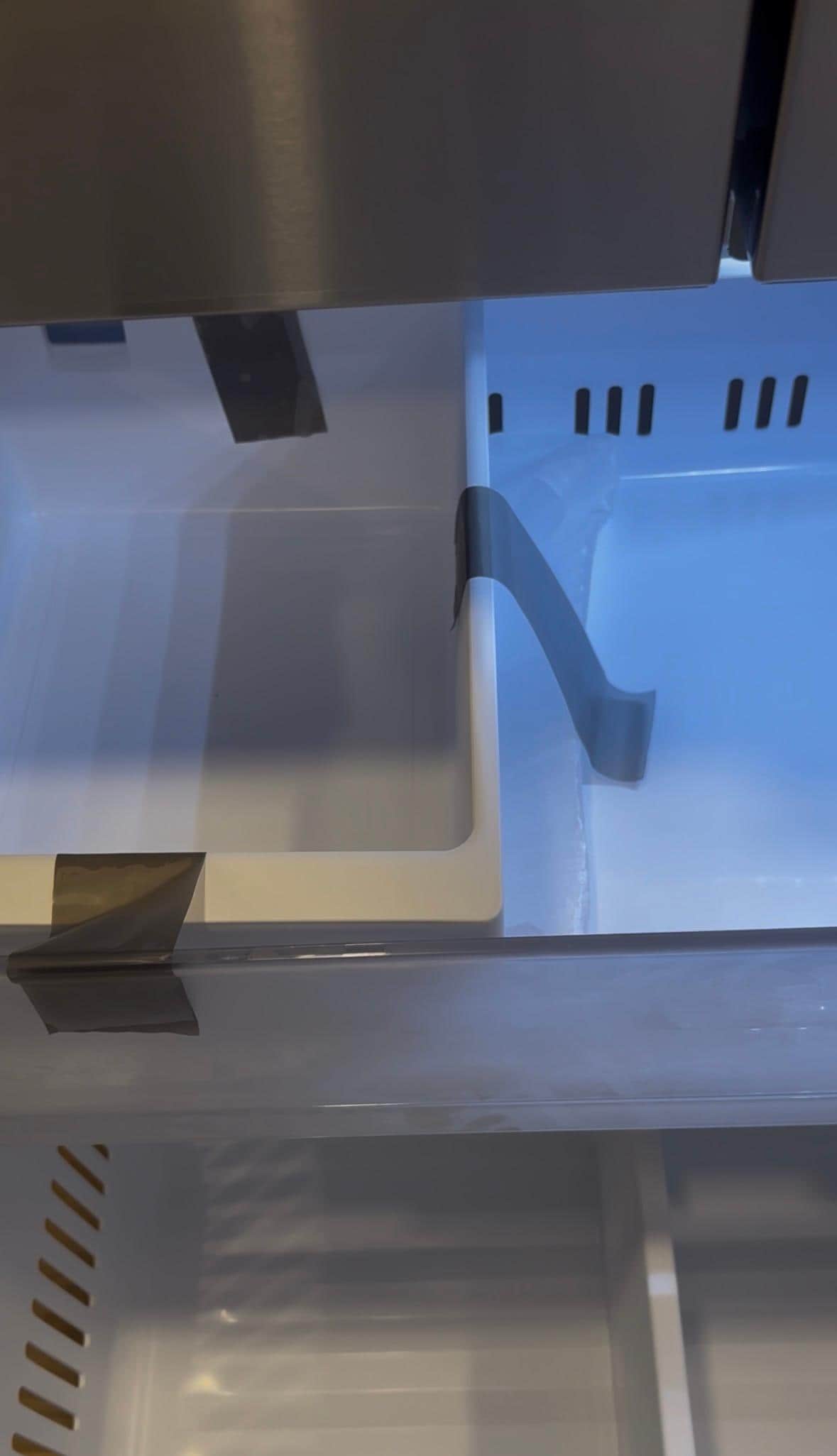 No ice, everything in freezer still taped.