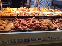 Tons of pastry and cheese selections with fresh fruits, yogurt and jam