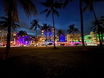 Hotel at night with all the adjoining restaurants