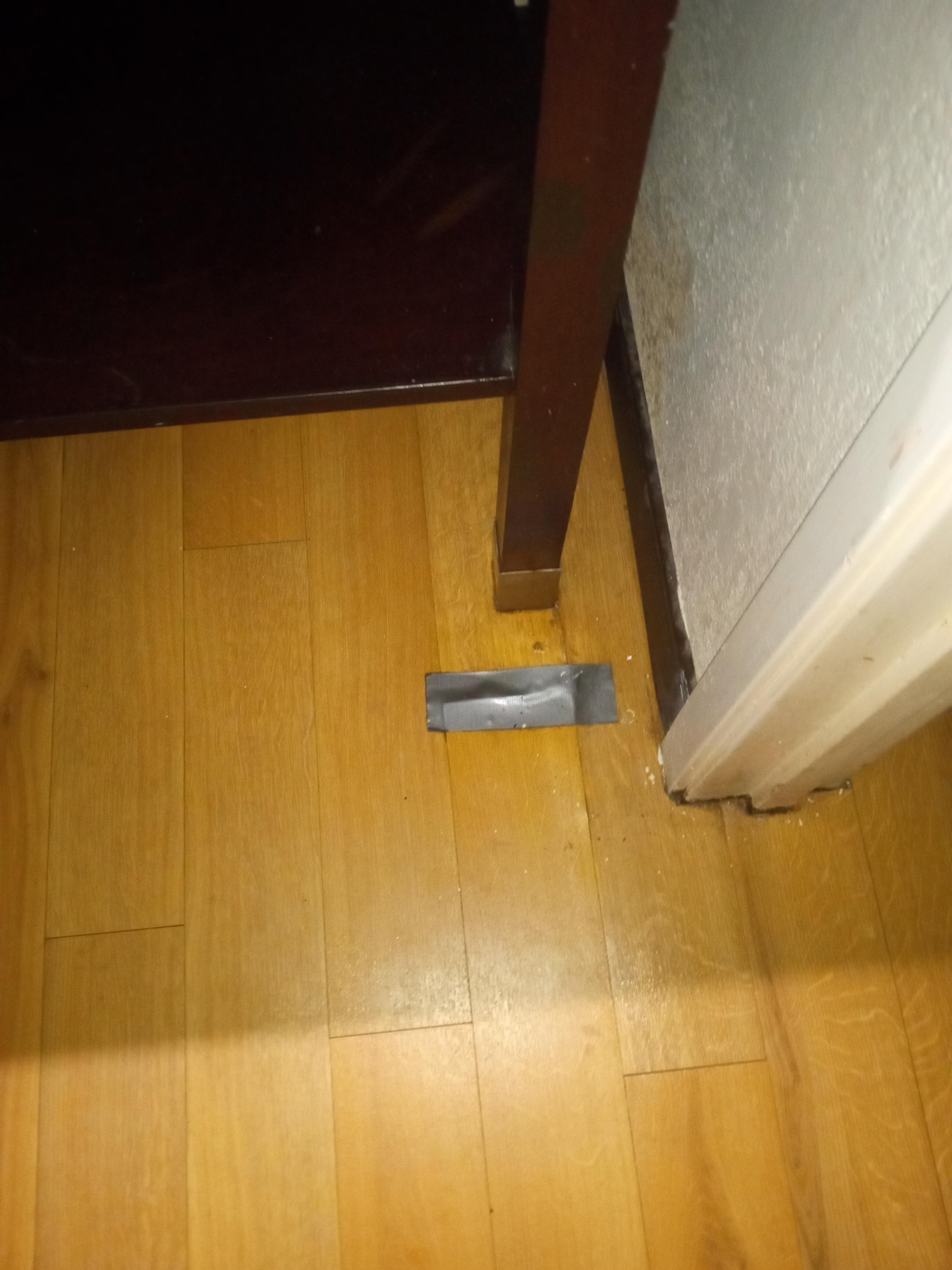 Flooring cut, tape repair.