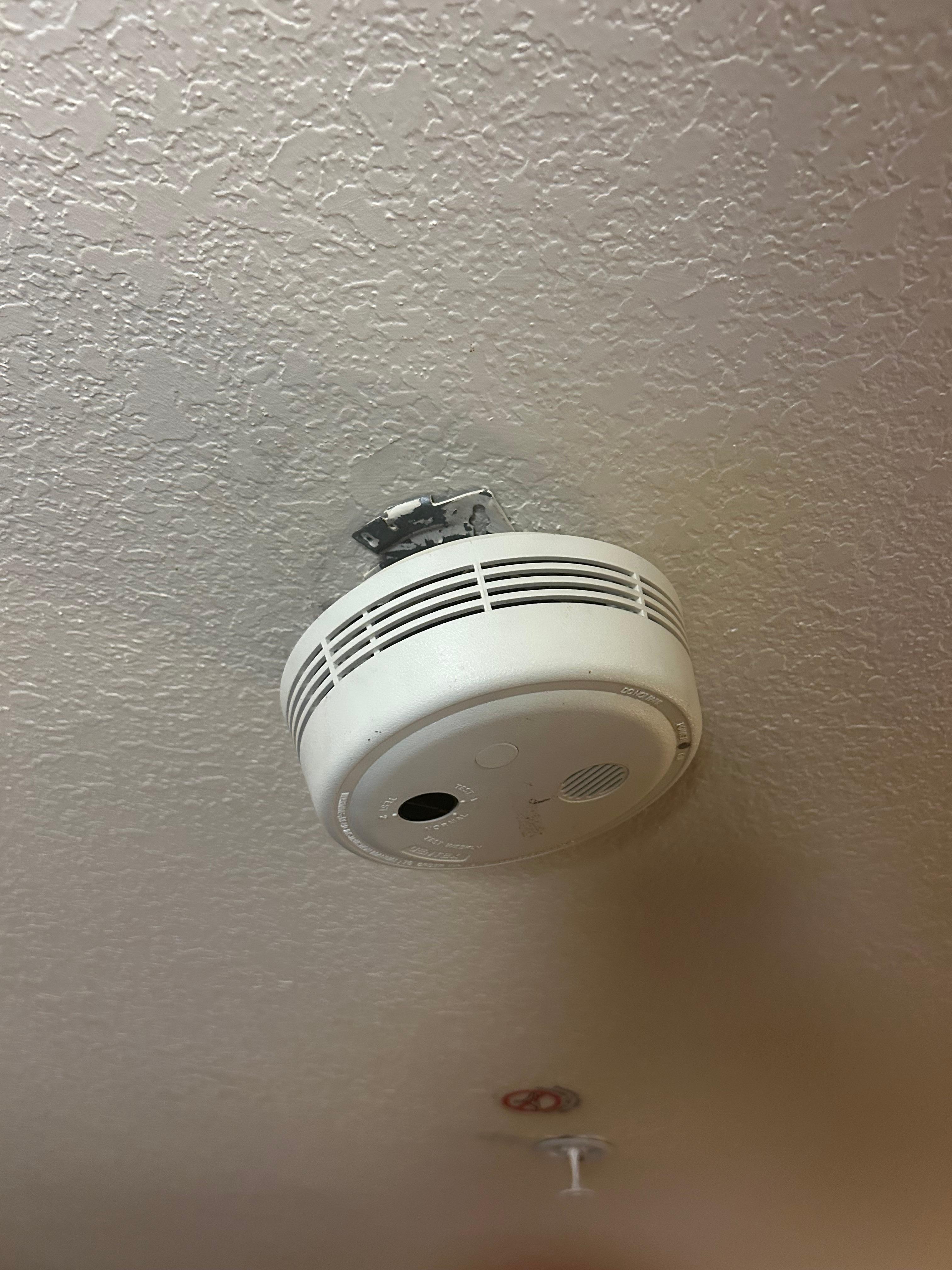 Hanging and broken fire detector