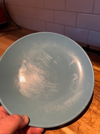 Dirty plates from the kitchen cupboard
