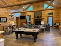 Large living area with pool table