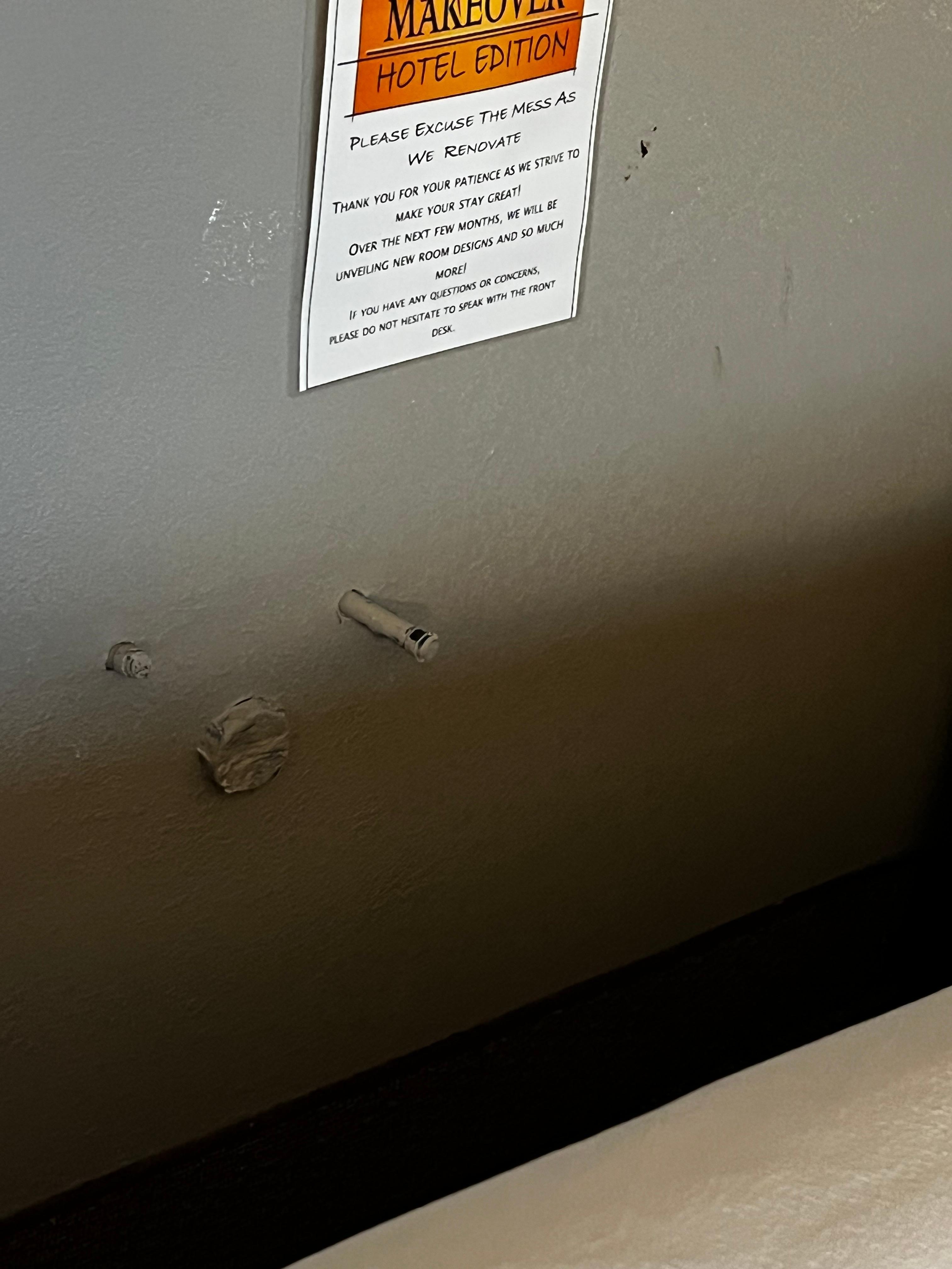 Pipes in wall in room