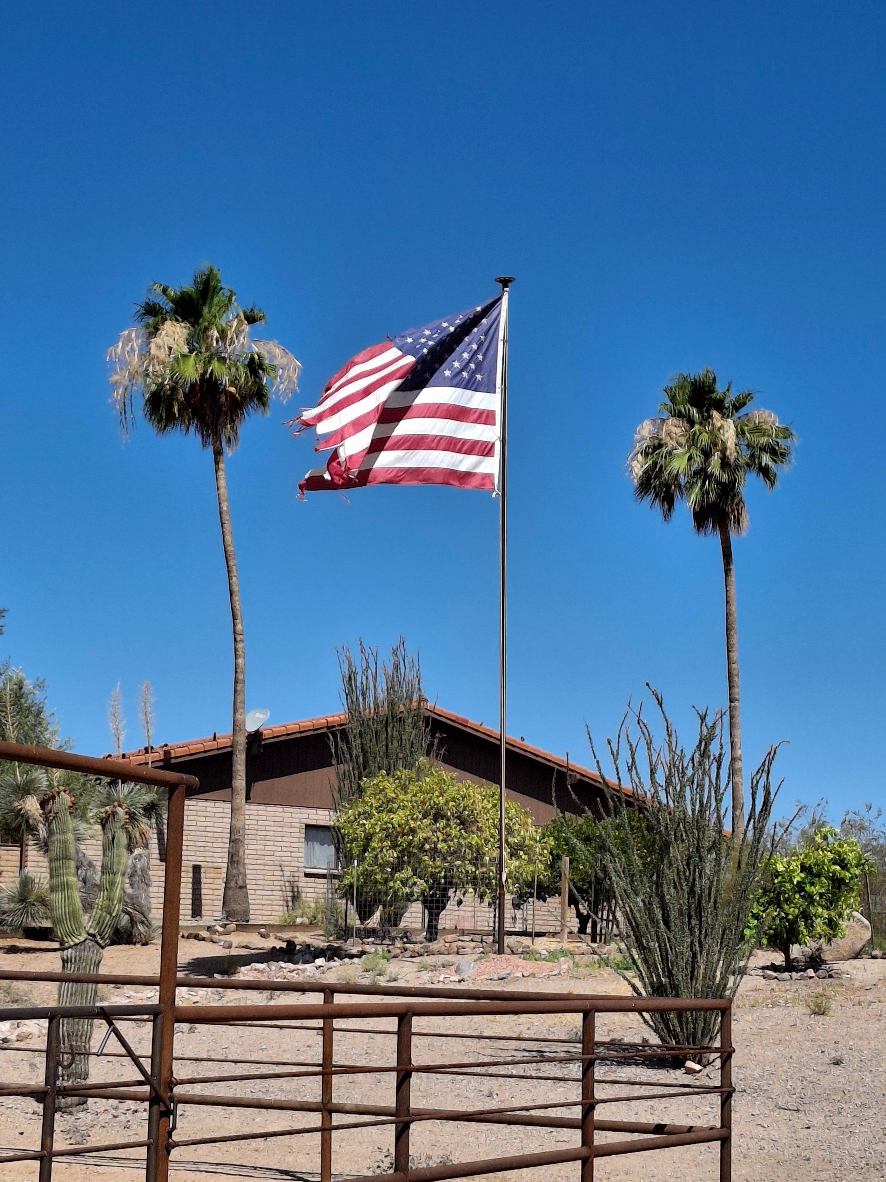 The flag over the ranch house