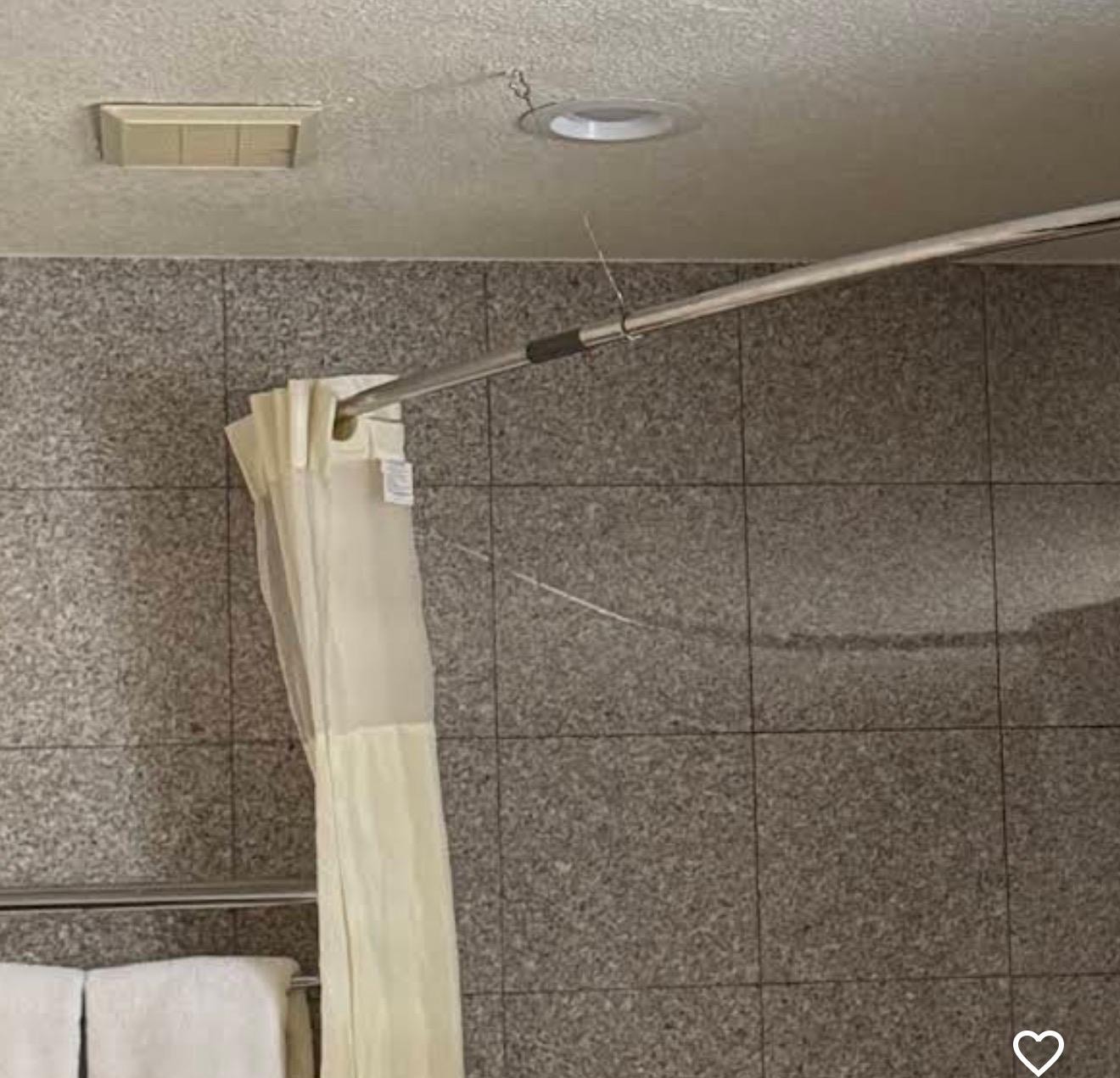 Hook for loose shower pole